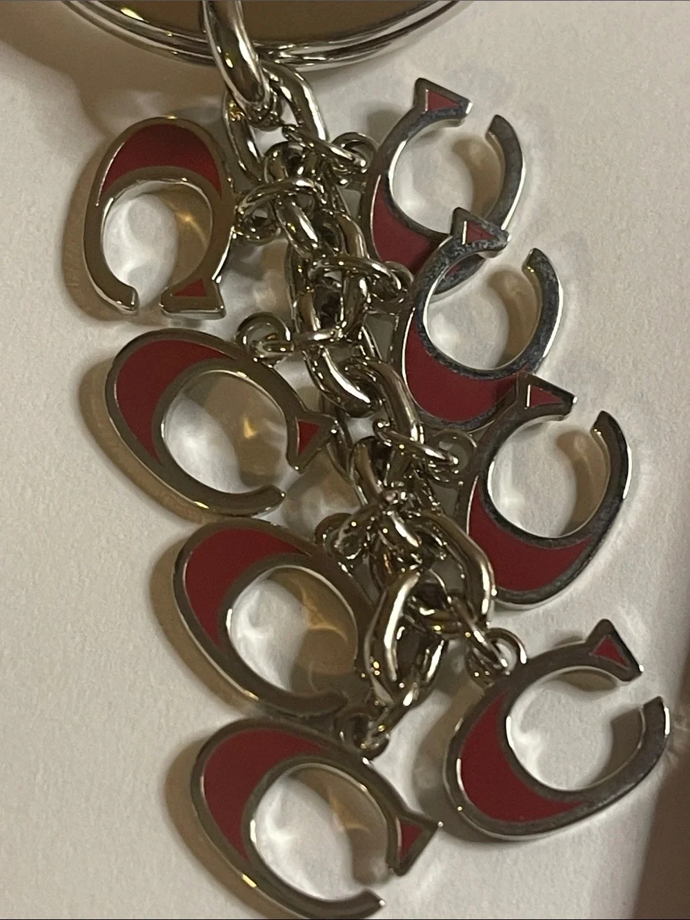Coach Silver-Tone Keyring with Red Enamel 'C' Charms and Coach Pen